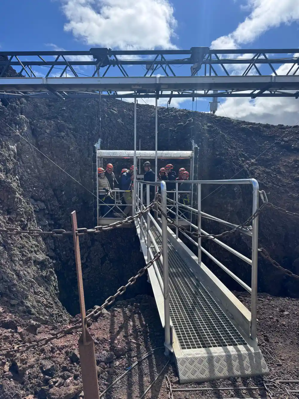 The walkway out to the lift platform with the party waiting on it